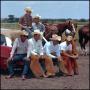 Photograph: [Cowboys taking a break]