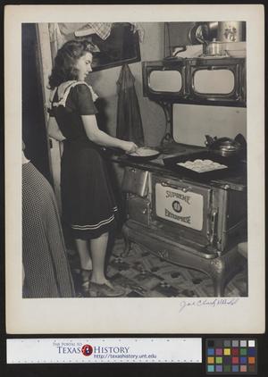 Primary view of object titled '[Hazel Petrey cooking breakfast on her wedding day(1)]'.