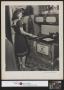 Thumbnail image of item number 1 in: '[Hazel Petrey cooking breakfast on her wedding day(1)]'.