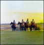 Photograph: [Four riders on horseback]