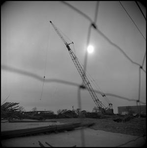 Primary view of object titled '[Crane in materials lot 1]'.