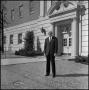 Primary view of [Dean A. Witt Blair standing in front of the Education-Home Economics Building]