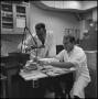 Photograph: [Biology researchers working at station]