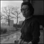 Photograph: [Jeanette Brusie on porch]