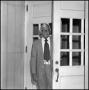 Photograph: [Dean A. Witt Blair standing in doorway]