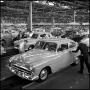 Photograph: [Automobiles in a factory, 3]