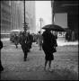 Photograph: [People crossing the street in the snow]
