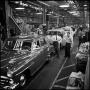 Photograph: [Automobiles in a factory, 11]