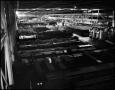 Photograph: [Lone worker on the warehouse floor]