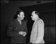 Photograph: [Two military officers talking together]