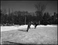Photograph: [Two boys ice skating]