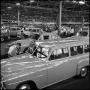 Photograph: [Automobiles in a factory, 19]