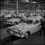 Photograph: [Automobiles in a factory, 9]