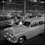 Photograph: [Automobiles in a factory, 20]