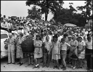 Primary view of object titled '[Crowd of people praying at the Dynamic Kernels Tithing Wheat experiment]'.