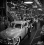 Photograph: [Automobiles in a factory, 13]