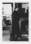 Photograph: [Bill Nelson in a trench coat]