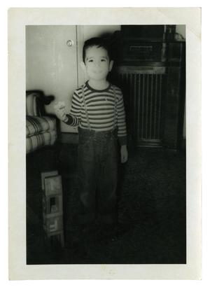Primary view of object titled '[Johnny Cuellar with overalls]'.