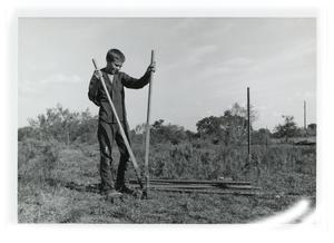 Primary view of object titled '[Child with wire fence]'.