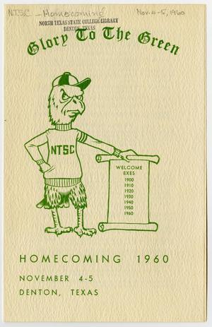 A white program cover, with green ink on it. The title of it says Glory to The Green. Under it is a drawing of an eagle with a hat and shirt. Under it, it says Homecoming 1960. The top of it has someone's handwriting on it in pencil.