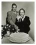 Photograph: [Macario and Adelaida Cuellar cutting a cake]