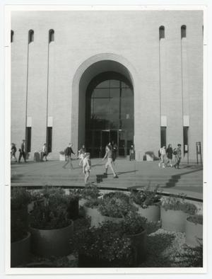 Primary view of object titled '[Students walking past Willis Library and Library Mall #2]'.