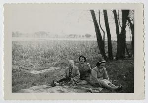 Primary view of object titled '[Adelaida, Julia, and Carolina Cuellar picnicking]'.