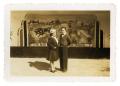 Photograph: [Couple in front of mural]