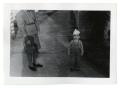 Thumbnail image of item number 1 in: '[Woman and Johnny Cuellar standing]'.