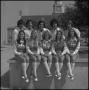 Photograph: [Cheerleaders in front of the Administration Building]