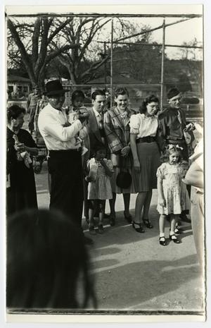 Primary view of object titled '[Photograph of spectators]'.