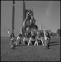 Photograph: [Cheerleaders pose in pyramid, 2]