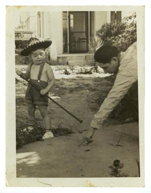 Primary view of object titled '[Bob Cuellar wearing a hat]'.