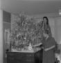 Photograph: [Girls decorating Christmas tree in quad 3]