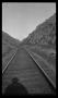 Thumbnail image of item number 1 in: '[Train tracks running through mountains]'.
