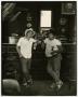 Photograph: [Photograph of two men standing by bar, 2]