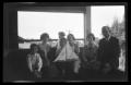 Photograph: [A group of people on a porch]
