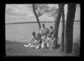 Photograph: [A group of young people at the lake]