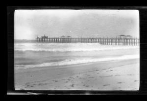 Primary view of object titled '[Distant pier over the ocean]'.