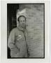 Photograph: [Photograph of man in jumpsuit]