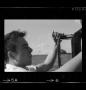 Photograph: [Photo of Roger Marshall driving a 1956 Ford, 3]