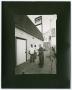 Photograph: [Photograph of people outside the Hi-Hat lounge]