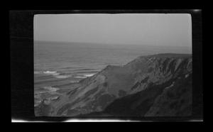 Primary view of object titled '[A hilly shoreline and the sea]'.