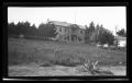Photograph: [A large two-story house]