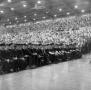Photograph: [Graduating Student Seated for Their Commencement Ceremony]