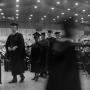 Photograph: [Graduating Students in Line to Receive Diploma]