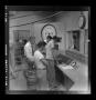 Photograph: [Bell employees working in a control room]