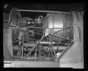 Primary view of object titled '[XH-40 engine showing cannon connections]'.