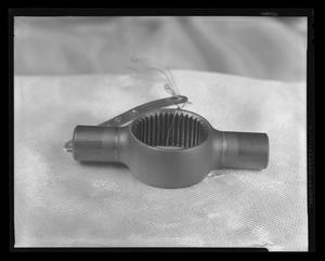 Primary view of object titled '[Worn part from an H-40 after a 150-hour ground run test]'.