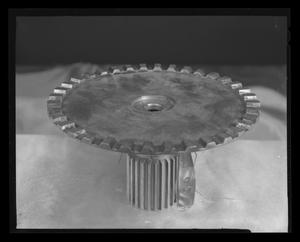 Primary view of object titled '[Worn part from an H-40 after a 150-hour ground run test]'.